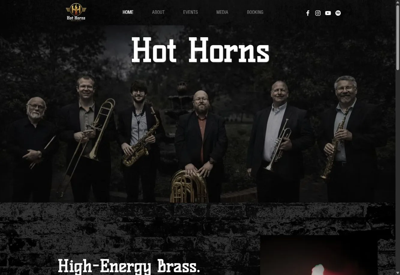 Hot Horns homepage with the ensemble’s name, band photograph, performance identity and booking navigation.